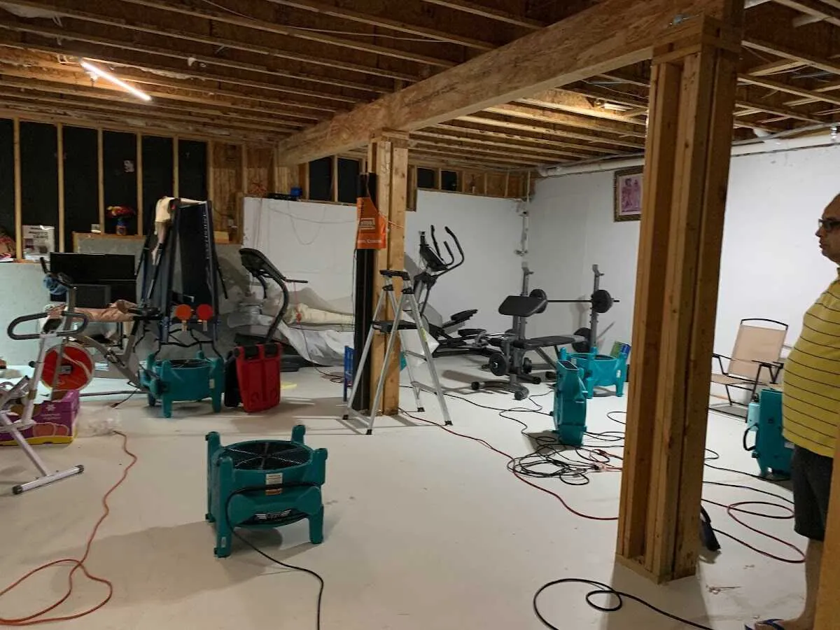 Basement drying equipment setup for Contents Cleaning & Restoration in Goshen