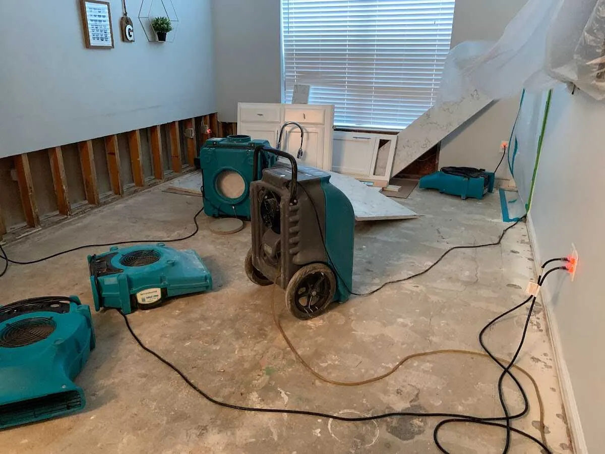 Dehumidifier in flood-cut room for Water Damage Restoration in Goshen